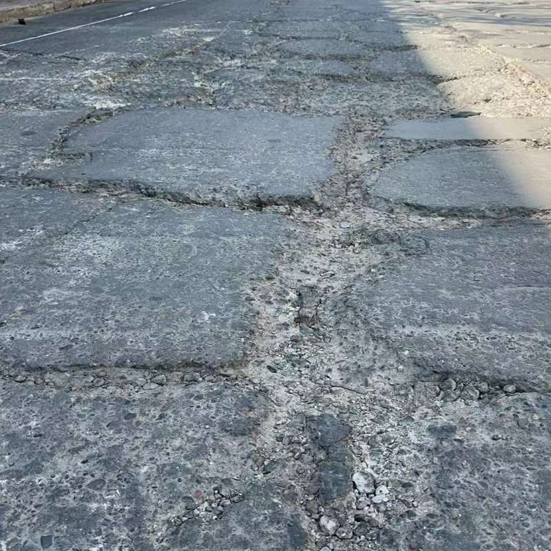 灵川路面起砂露石子修补料